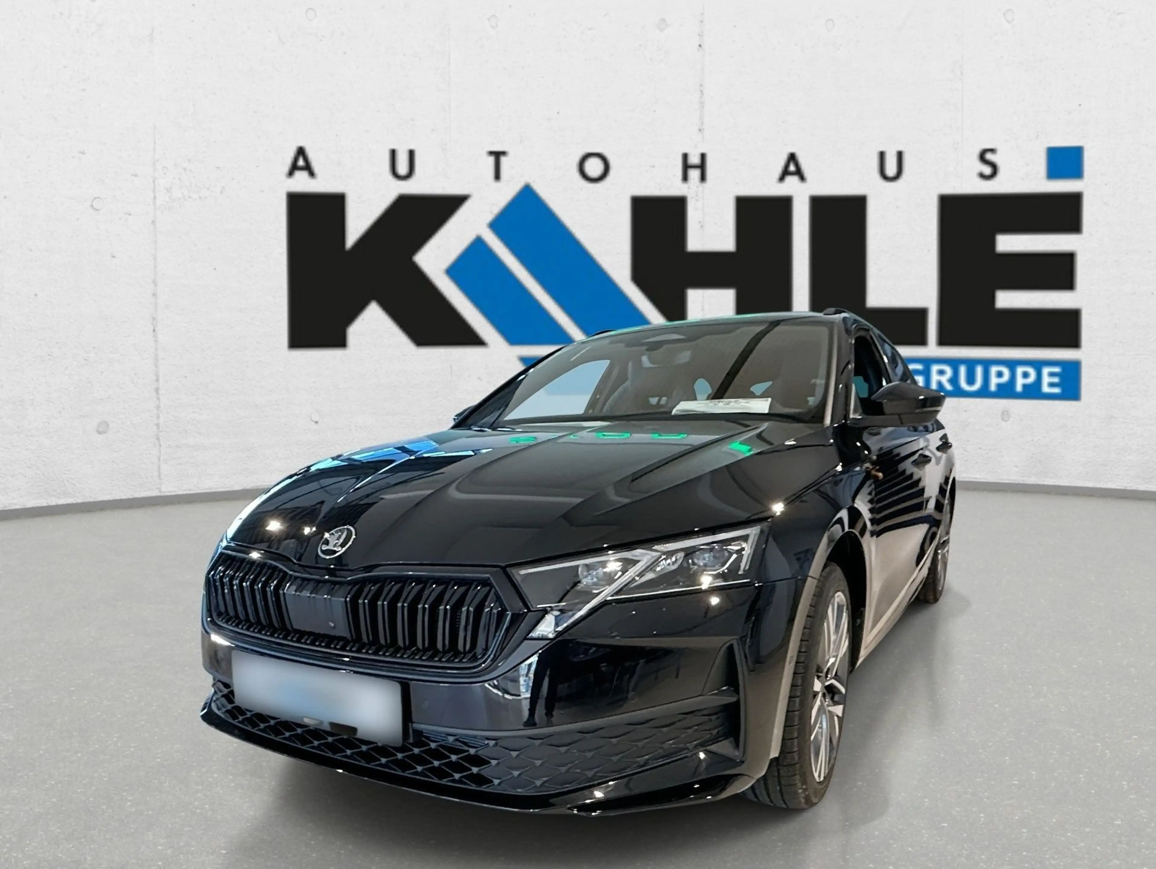 Skoda Octavia Combi 2.0 TDI W Sportline Pano Black ACC — photo 2