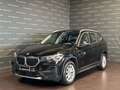 BMW X1 sDrive18d Business Advantage Zwart - thumbnail 1