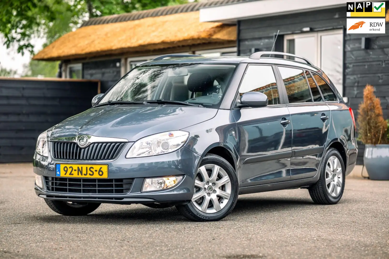 Skoda Fabia Combi 1.2 TSI Ambition I open dak I Navigatie I Cl Gris - 1