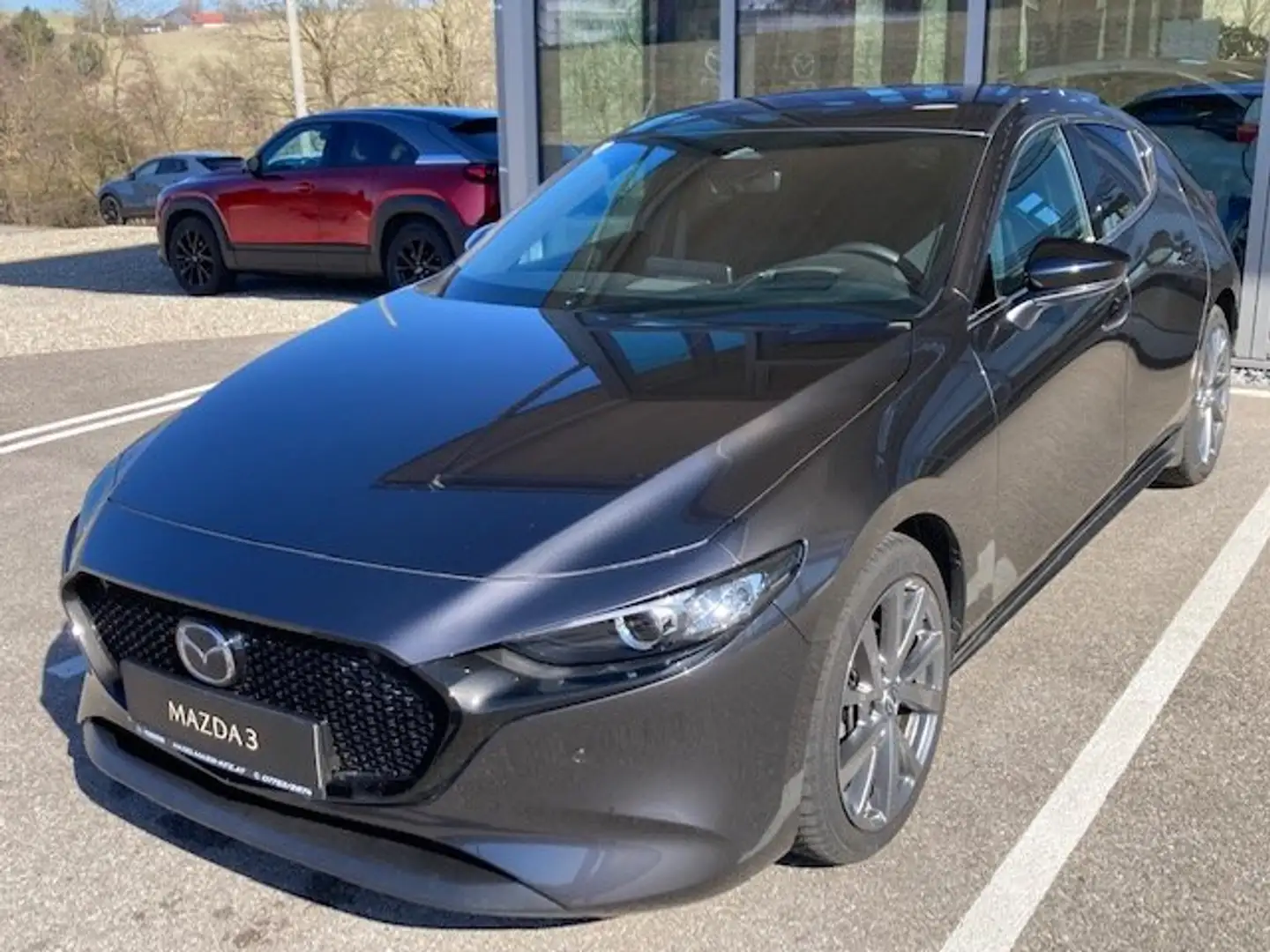 Mazda 3 e-Skyactiv-G122 Homura Grau - 1