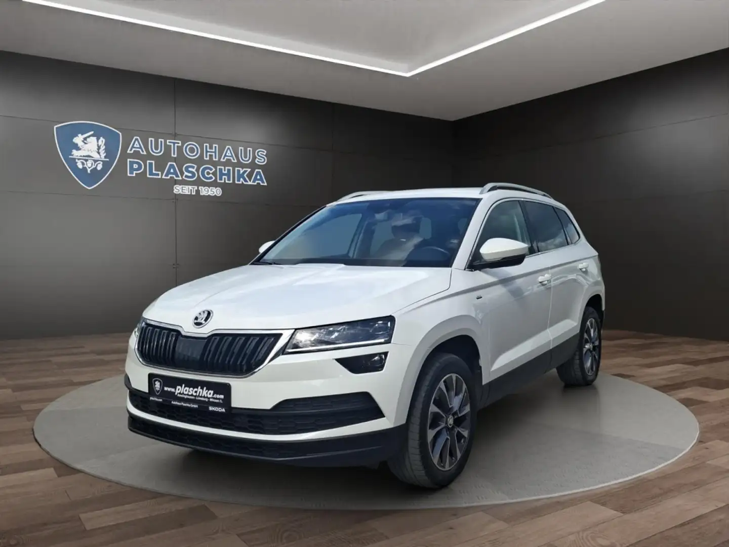 Skoda Karoq 1.5 TSI Drive 125 STANDHZ+NAVI+CANTON+LED Klima Weiß - 1