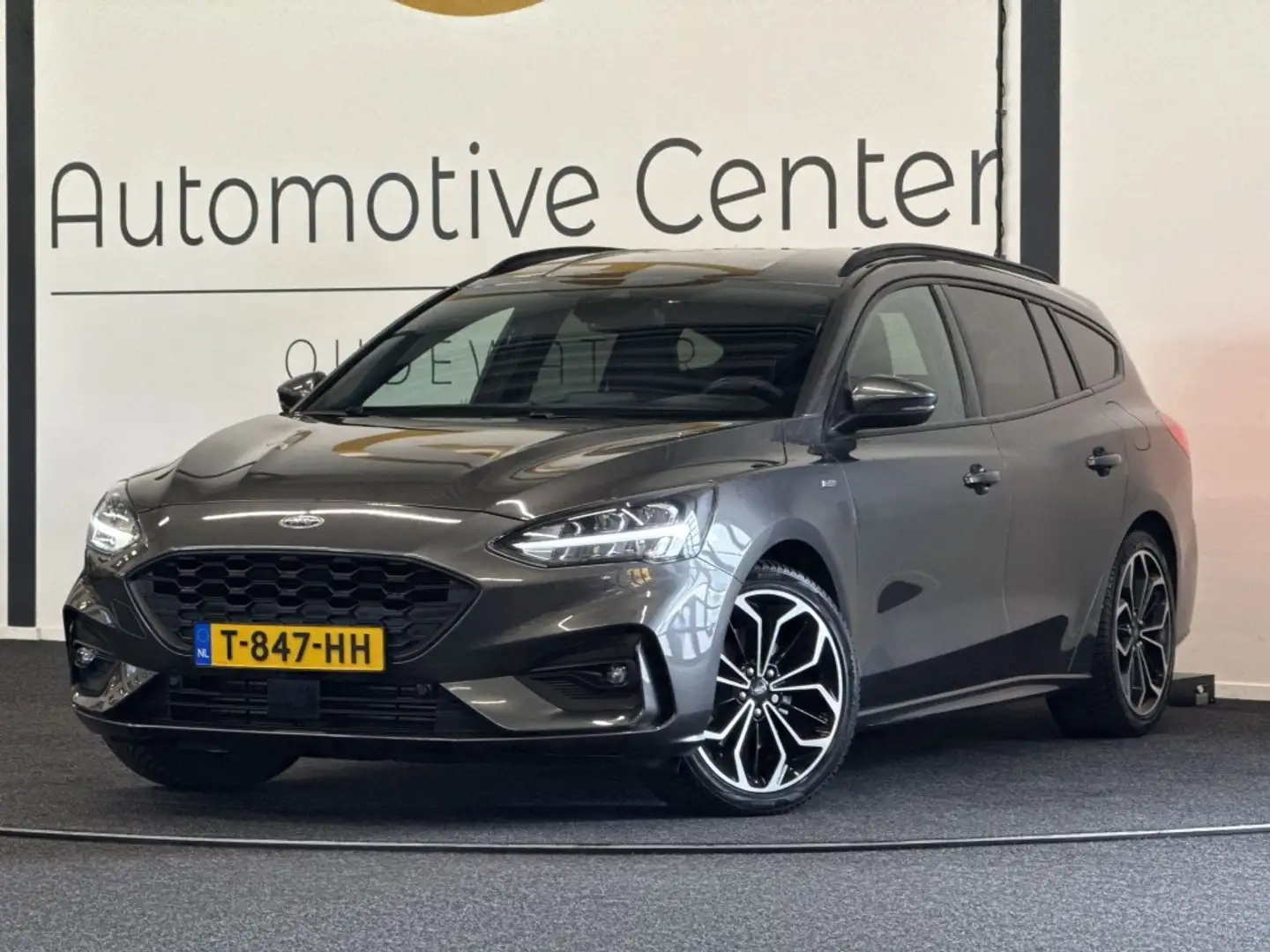 Ford Focus Wagon 1.0 EcoB. Tit. XBns ST-LINE | CAMERA | WINTE Grijs - 1