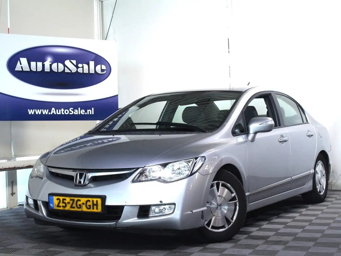 Honda Civic 1.3 Hybrid NAP APK-3/2026 ECC BT CRUIS STOELVW TRK Grigio - 1
