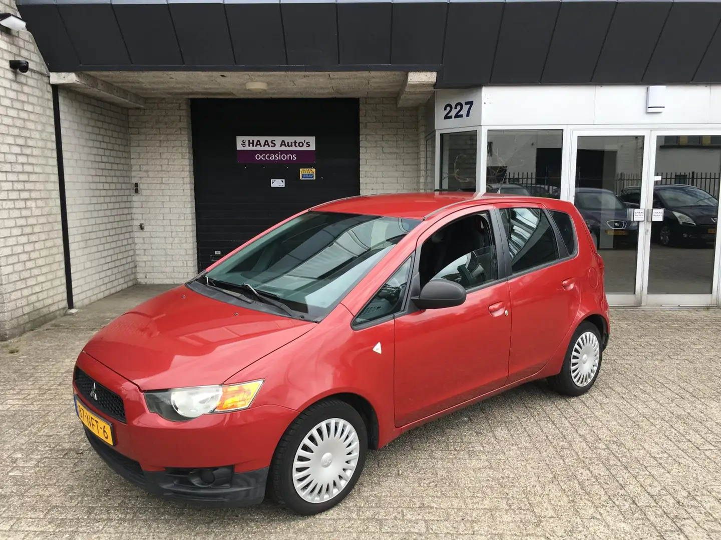Mitsubishi Colt 1.1 Edition One / AIRCO / NL-AUTO+NAP / 5 DEURS / Rood - 1