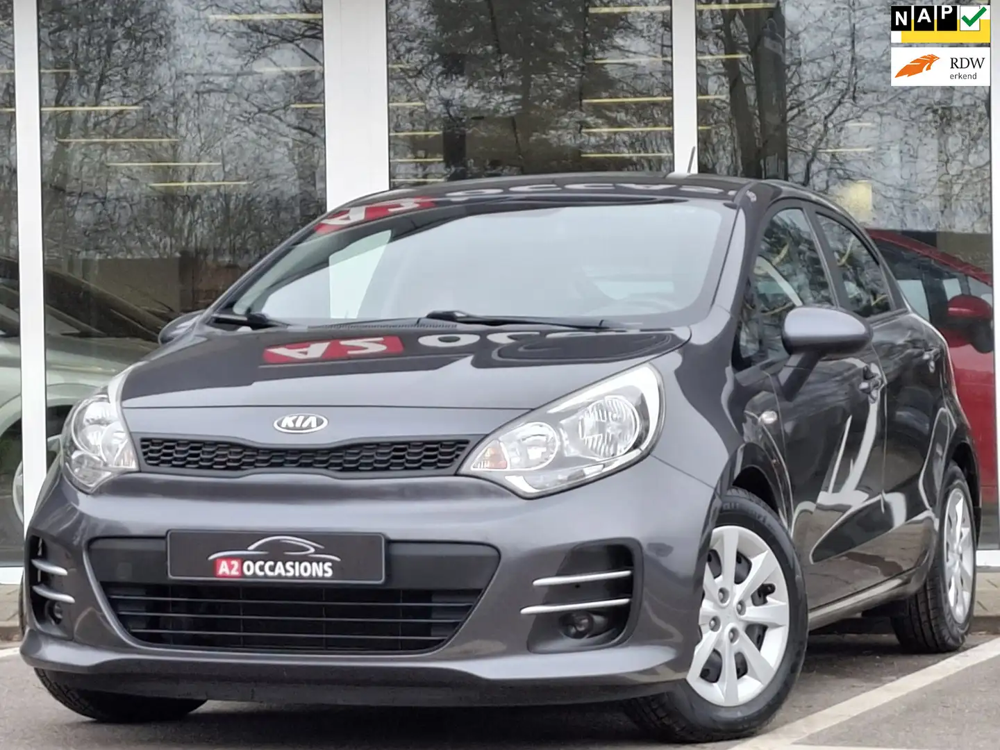 Kia Rio 1.2 (4 cilinder) Bluetooth/Airco/4 nwe all season Gris - 1