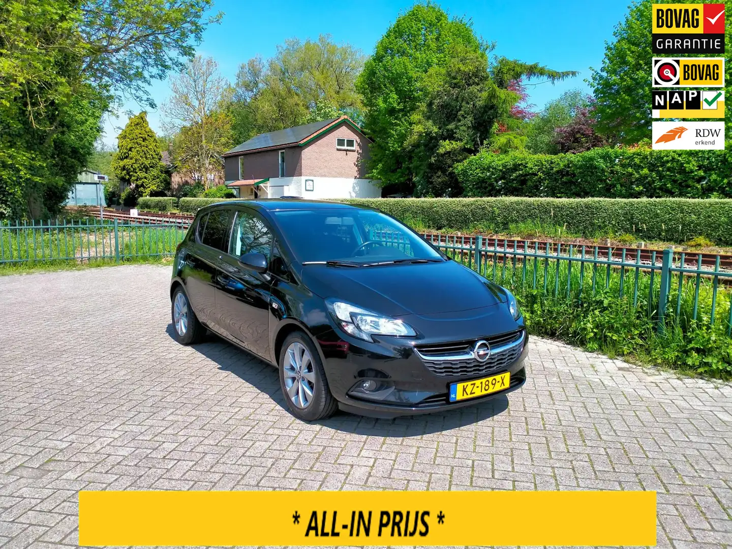 Opel Corsa 1.4 Edition + luxe uitv. clima 5 deurs lage km. RI Black - 1