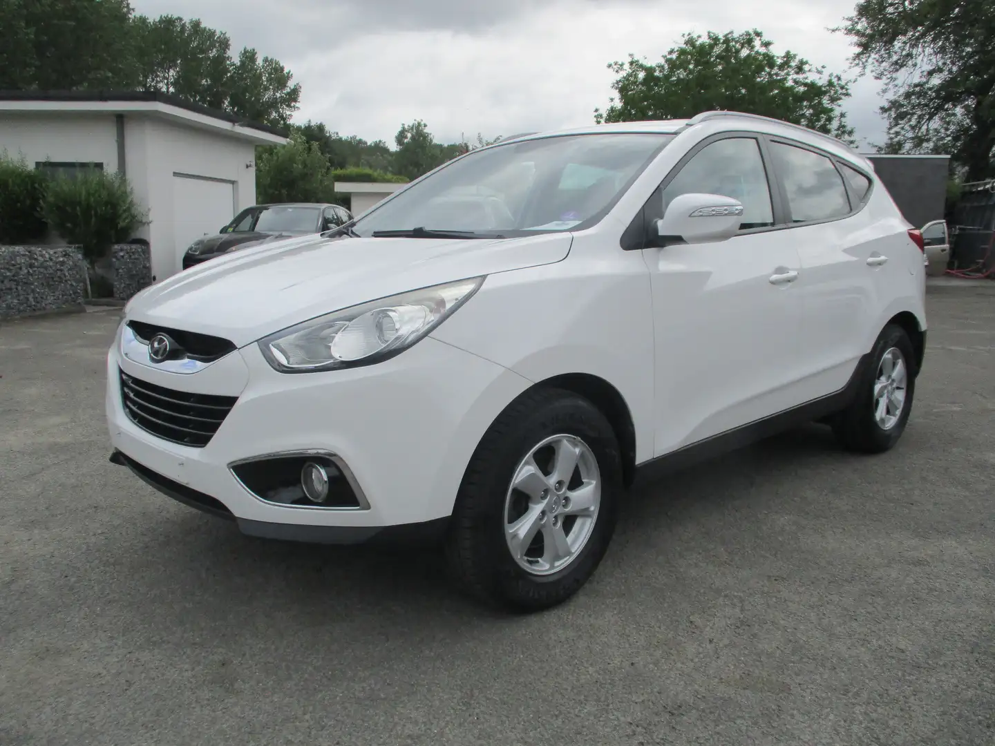 Hyundai iX35 1.6i 2WD Auto Airco/Garantie/Gekeurd/124.000km Wit - 1