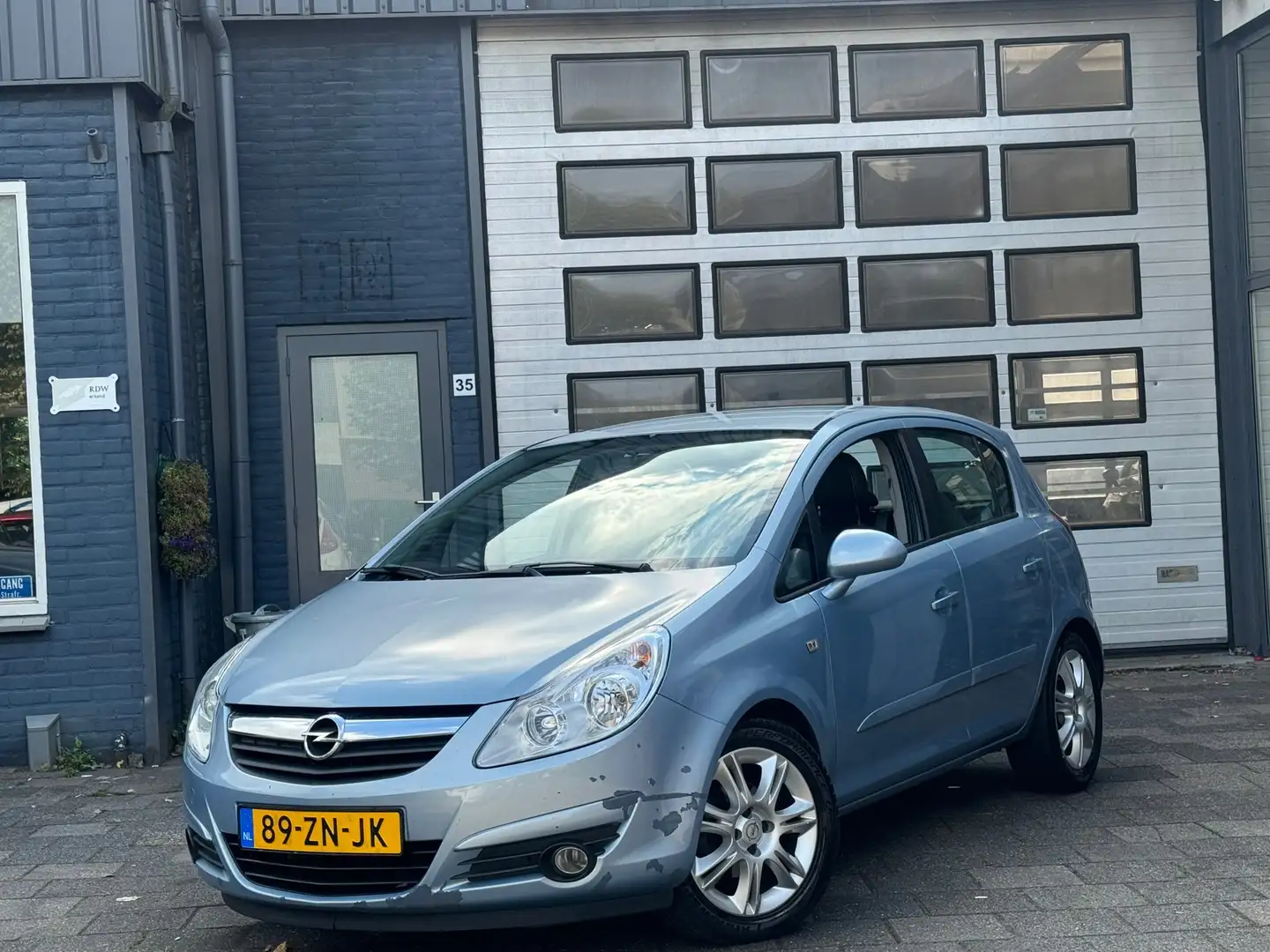 Opel Corsa 1.4-16V Cosmo | Airco | Cruise | 5-DRS Bleu - 1