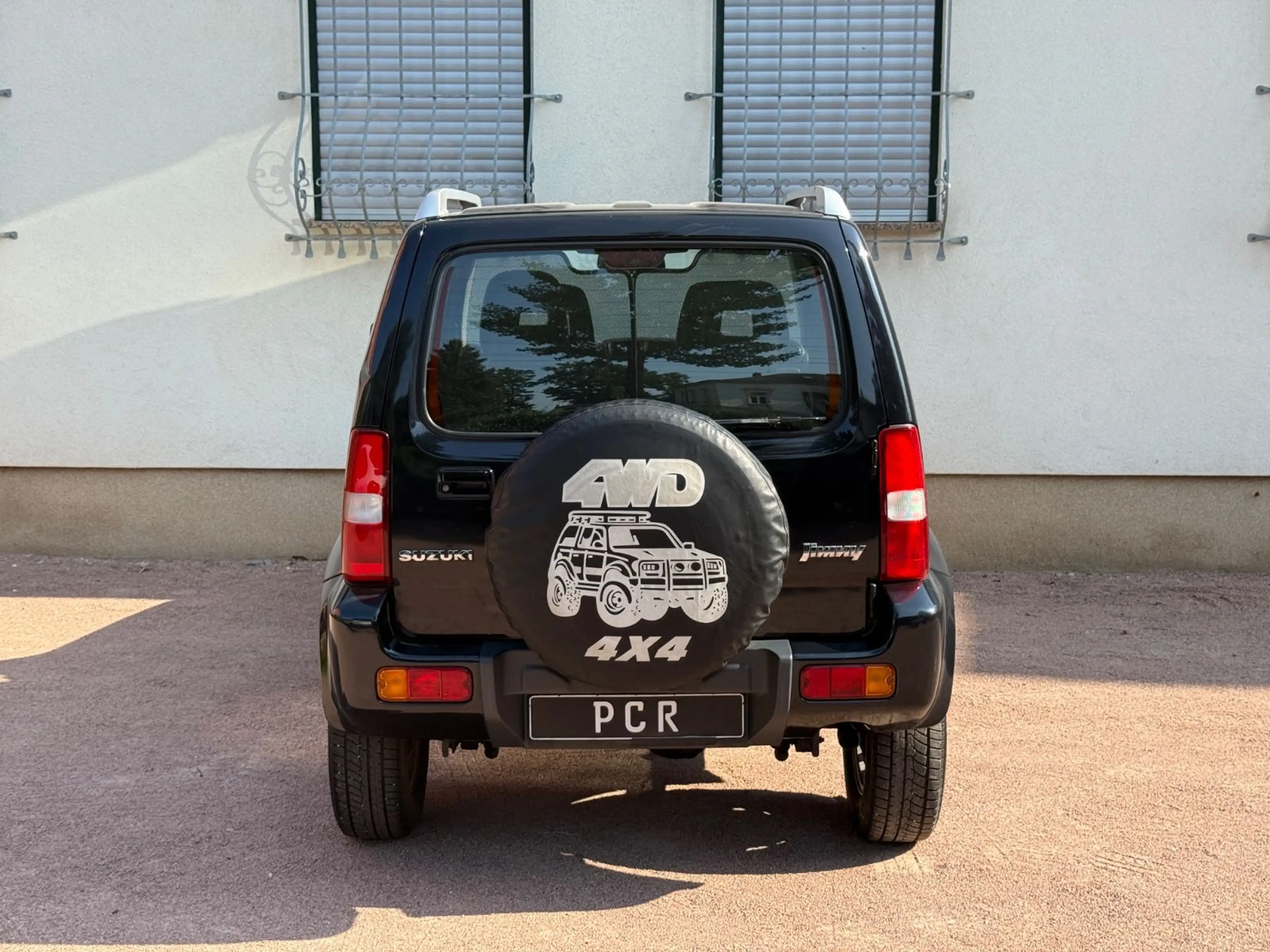 Suzuki Jimny 4x4 BLACK & WHITE*TÜV NEU*ALU — photo 6
