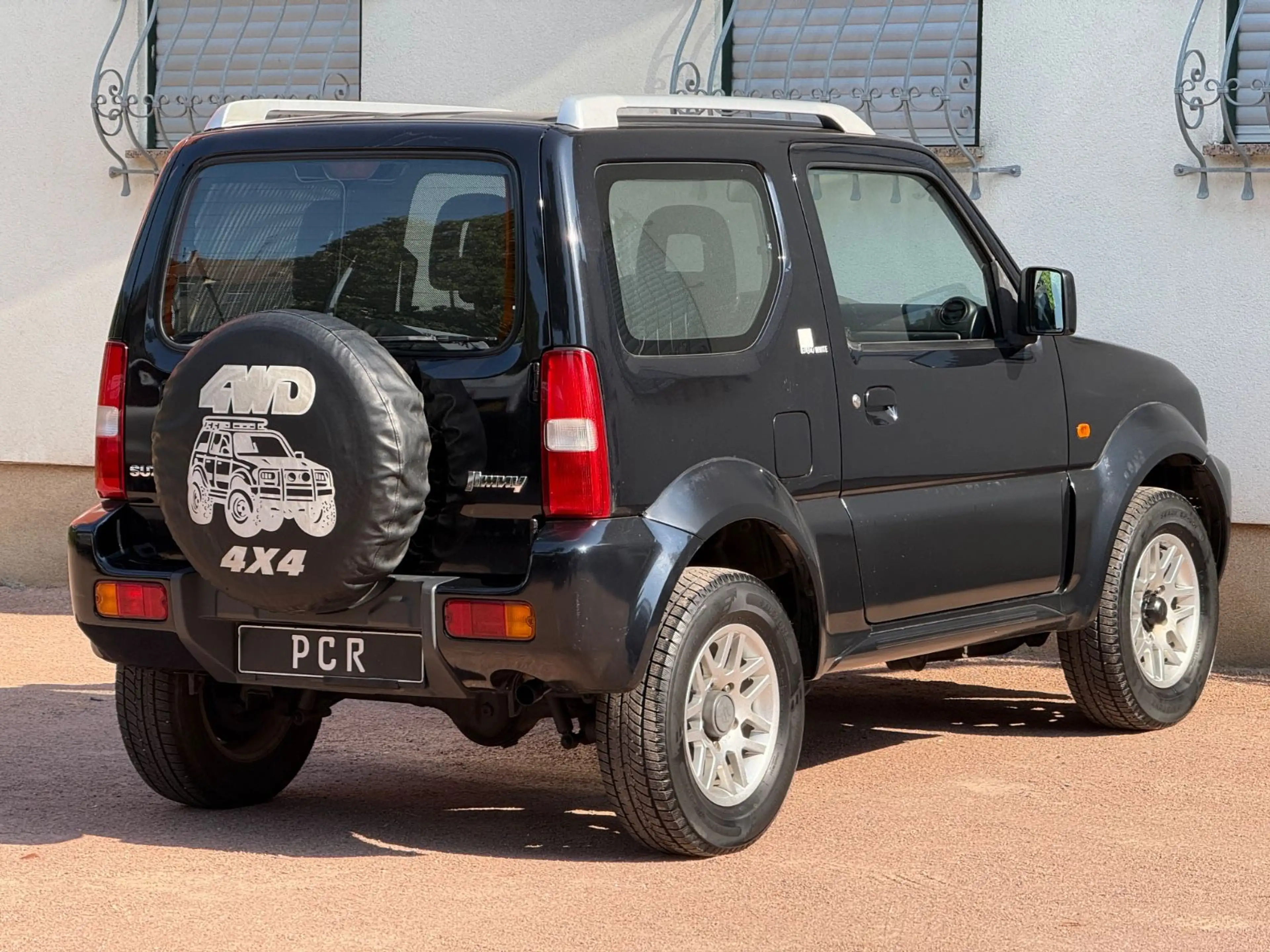 Suzuki Jimny 4x4 BLACK & WHITE*TÜV NEU*ALU — photo 5