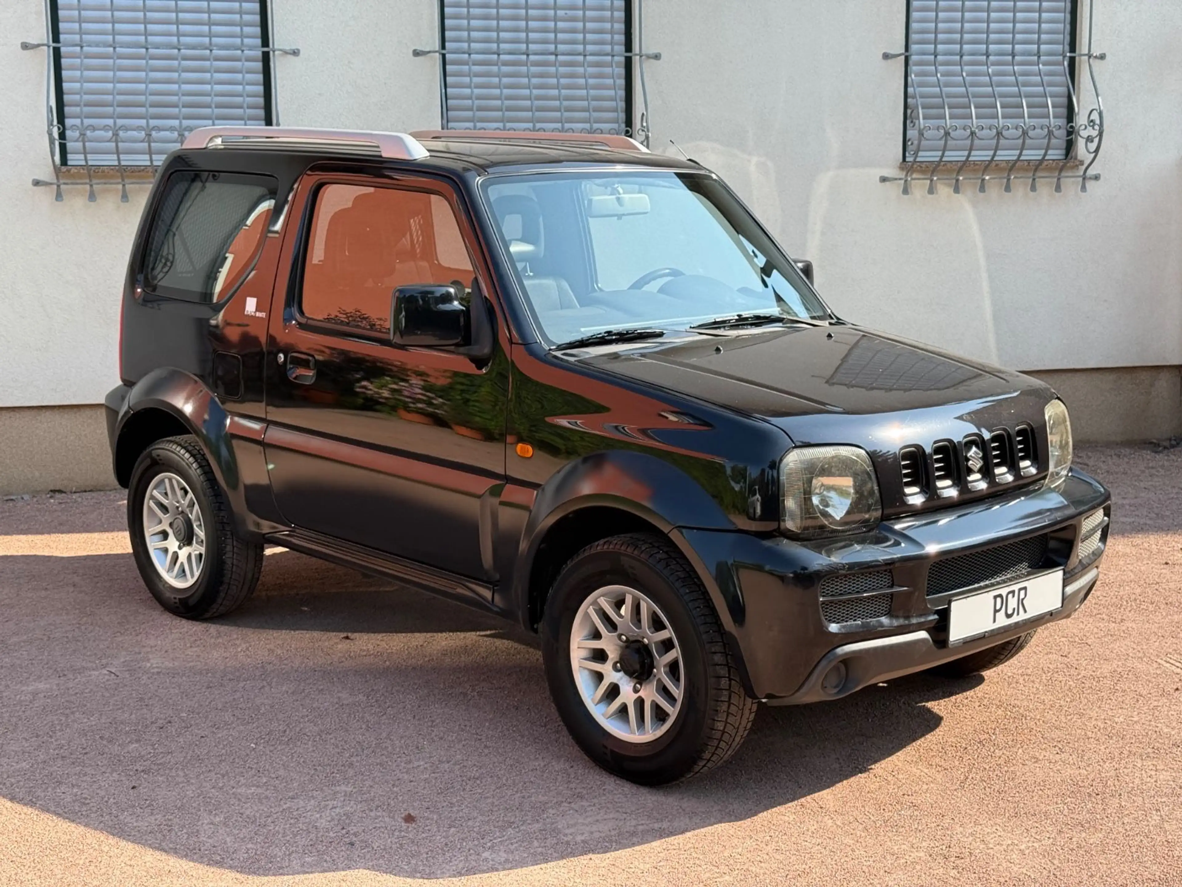 Suzuki Jimny 4x4 BLACK & WHITE*TÜV NEU*ALU — photo 3
