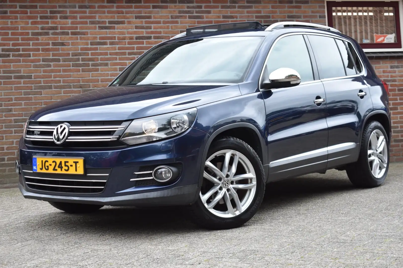 Volkswagen Tiguan 2.0 TDI Edition '15 Pano Clima Navi Cruise Inruil Blauw - 1