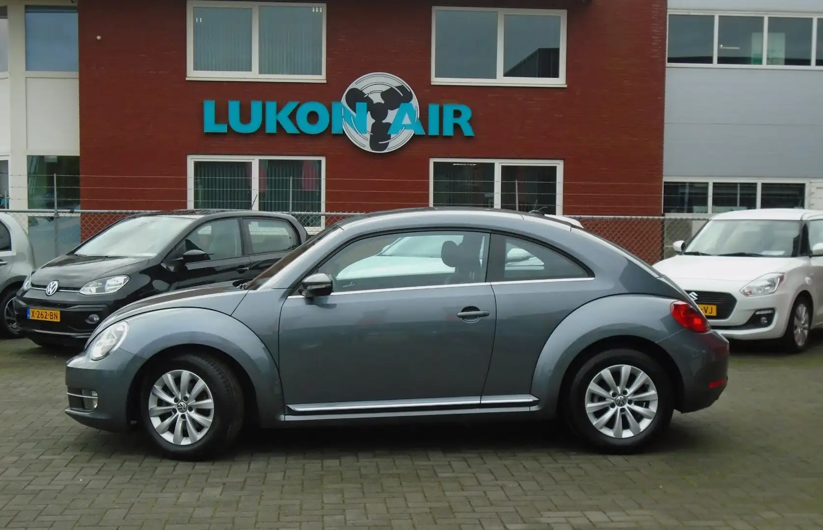 Volkswagen Beetle 1.2 TSI Design BlueMotion,Airco,Navi,Cruise Grey - 2