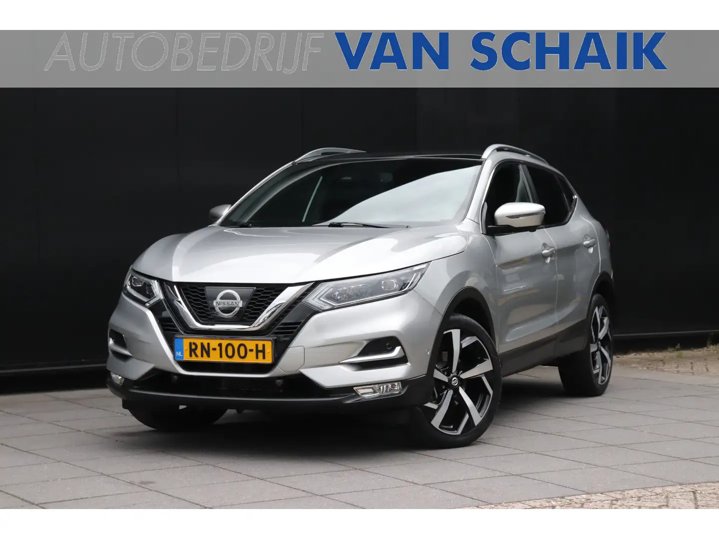 Nissan Qashqai 1.2 Tekna + | LEDER | PANO | STOELVERW. | 360° CAM Grijs - 1