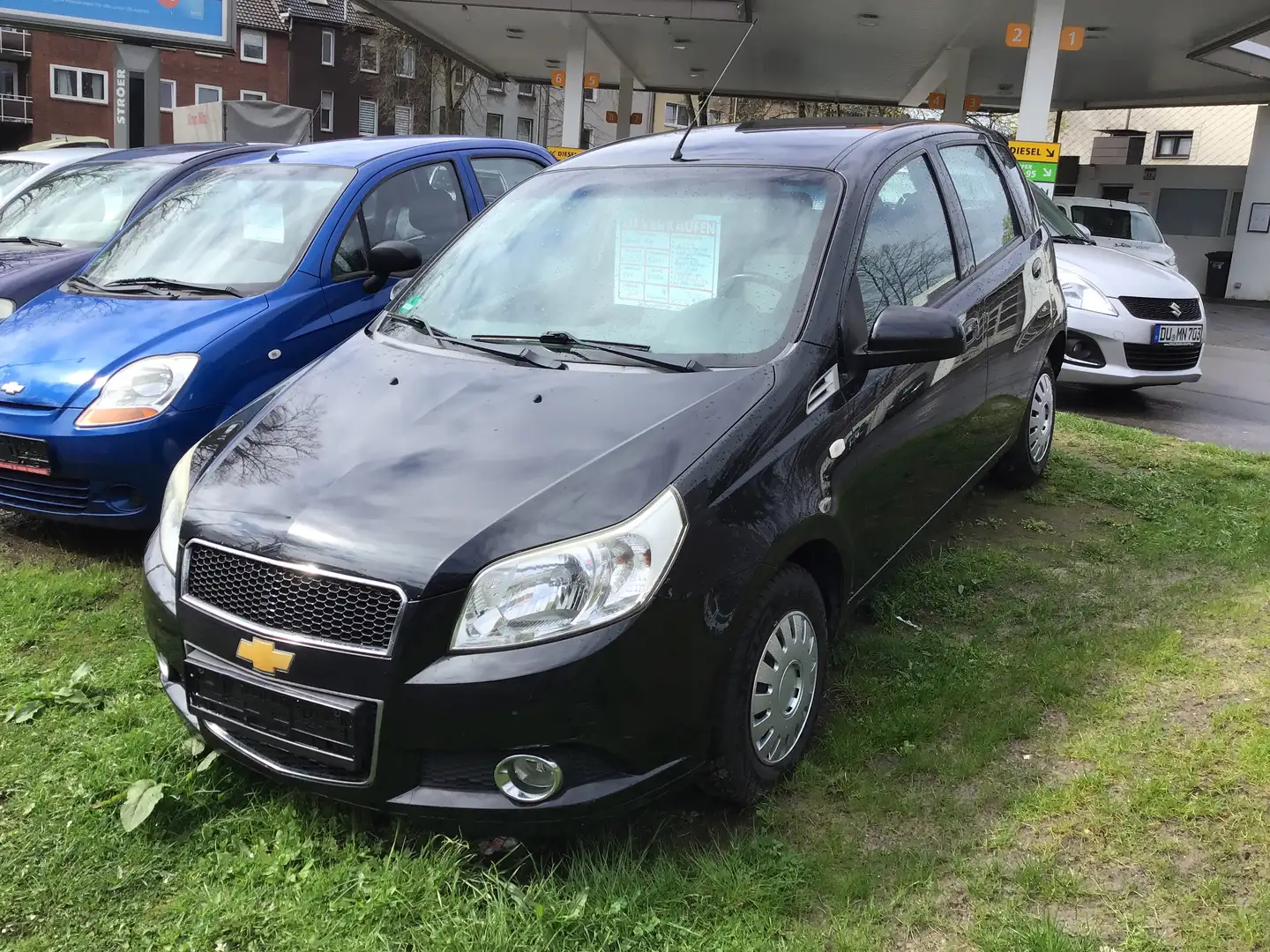 Chevrolet Aveo 2 J. TÜV, 1J. Garantie,Klima,eFh,Zv/FB,153 tkm Fekete - 1