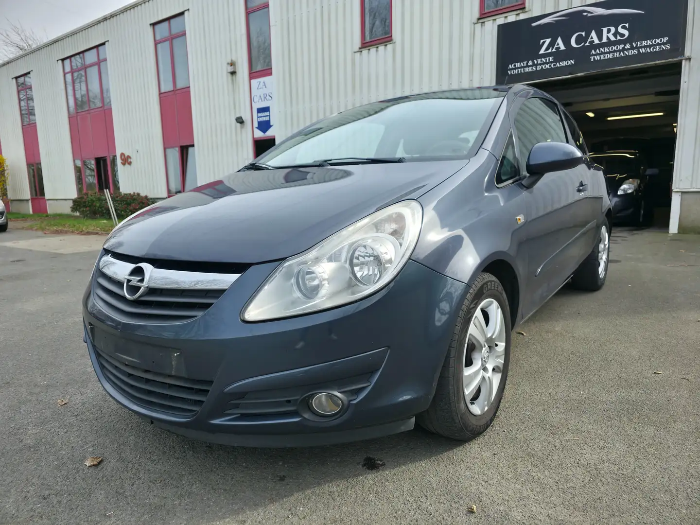 Opel Corsa 1.2i Enjoy Blauw - 1