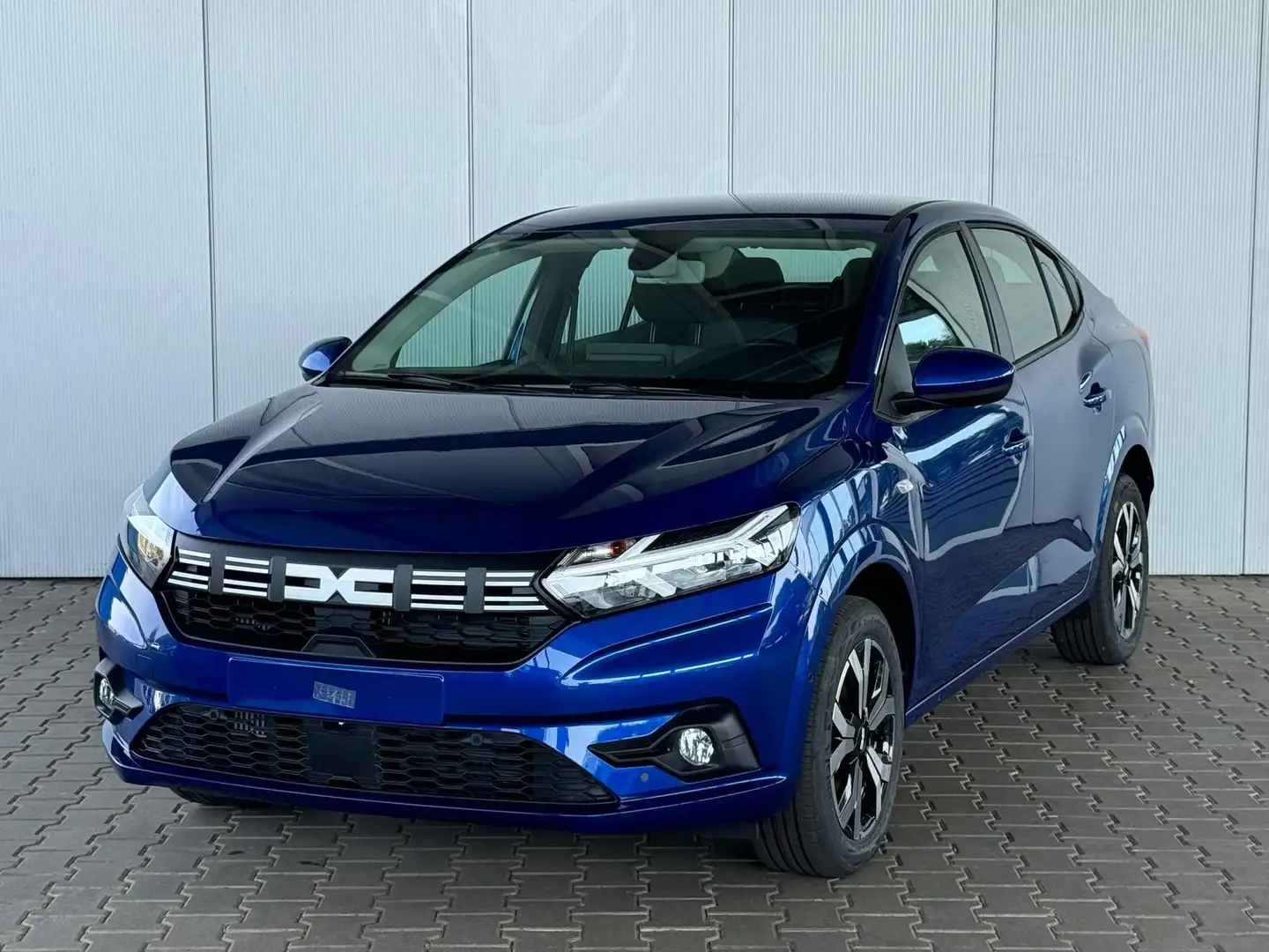 Dacia Logan PRESTIGE TCe 90 / PDC V&H + Kamera Klimaautom./... Blau - 1