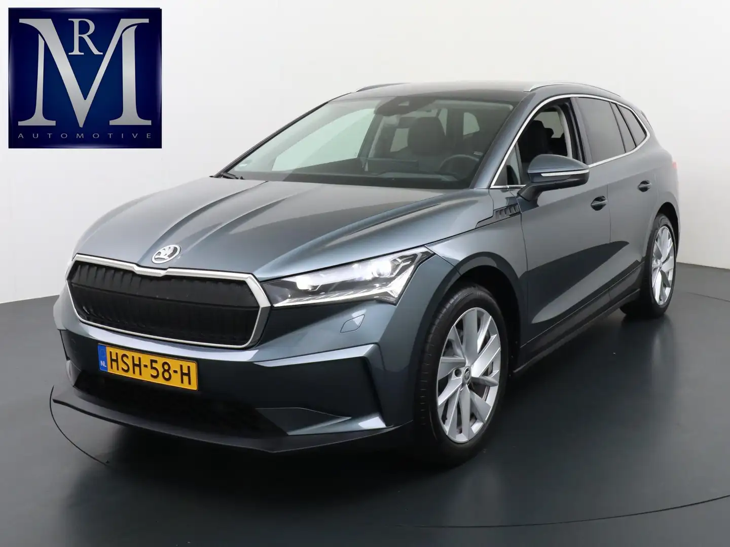 Skoda Enyaq iV 80 Loft ELEKTRISCHE TREKHAAK | CAMERA | HEAD UP Grijs - 1