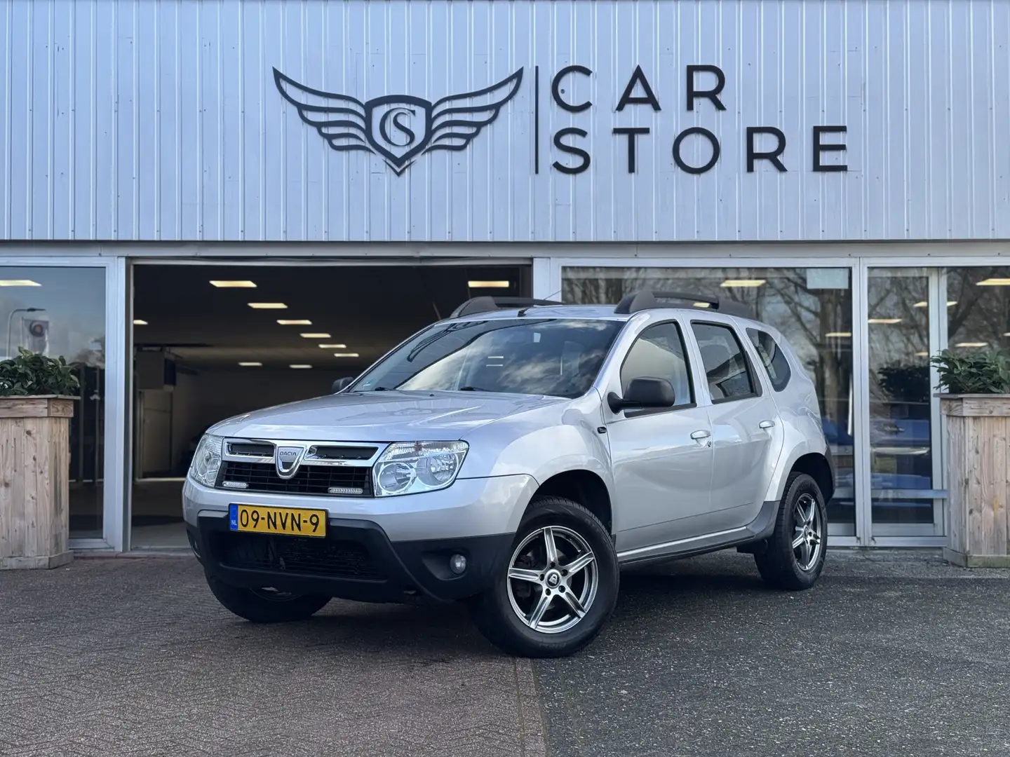 Dacia Duster 1.6 Lauréate 2wd |CARPLAY|AIRCO|ELEK. PAKKET|LM VE Grijs - 1
