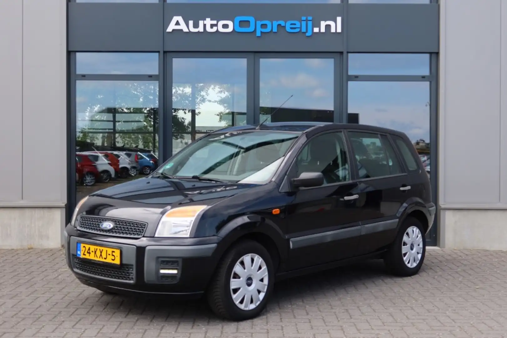 Ford Fusion 1.4 16V Cool & Sound Airco, 78.000km NAP Zwart - 1