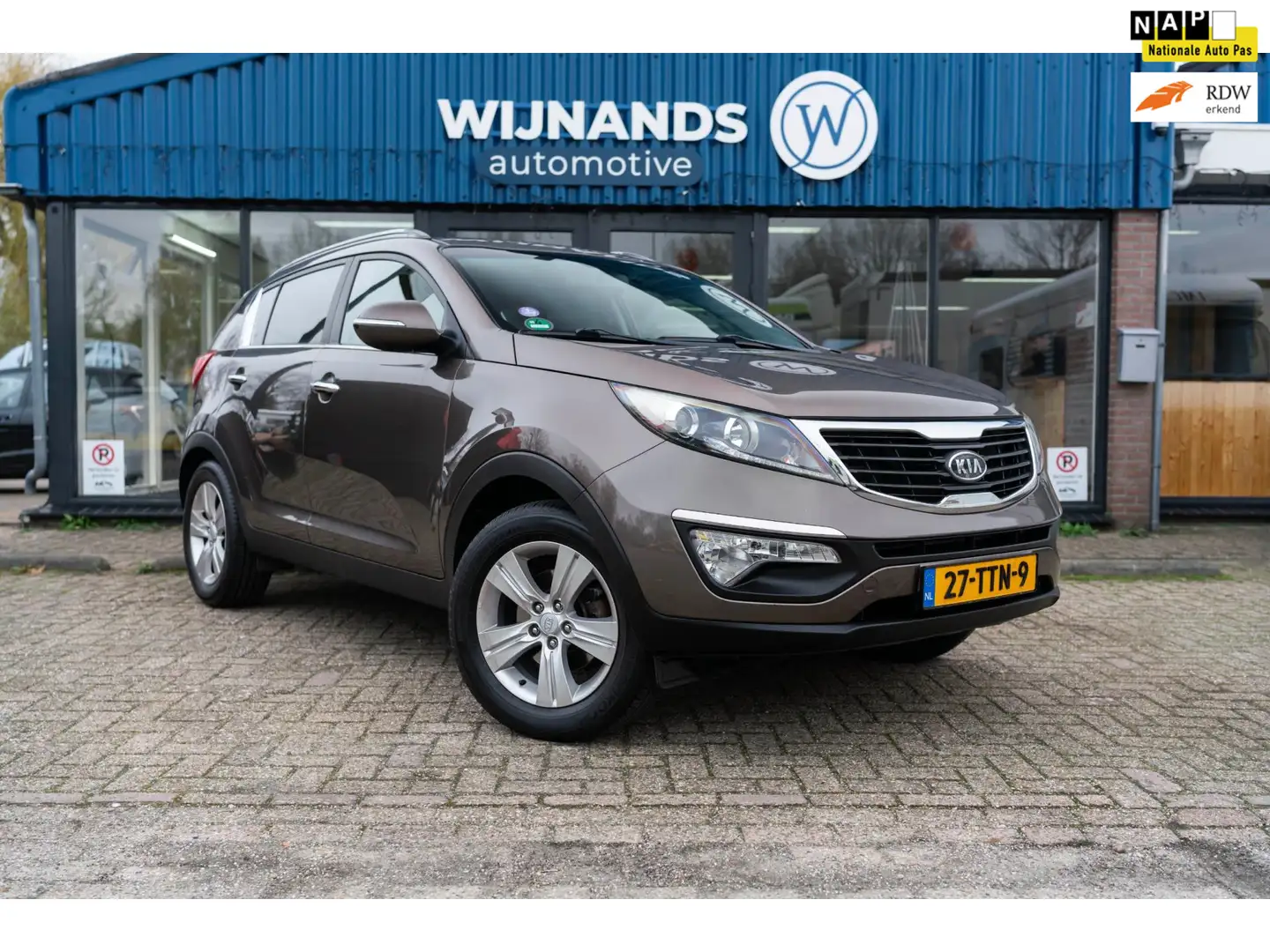 Kia Sportage 2.0 X-ecutive Plus Pack Trekhaak Cruise Clima Bruin - 1