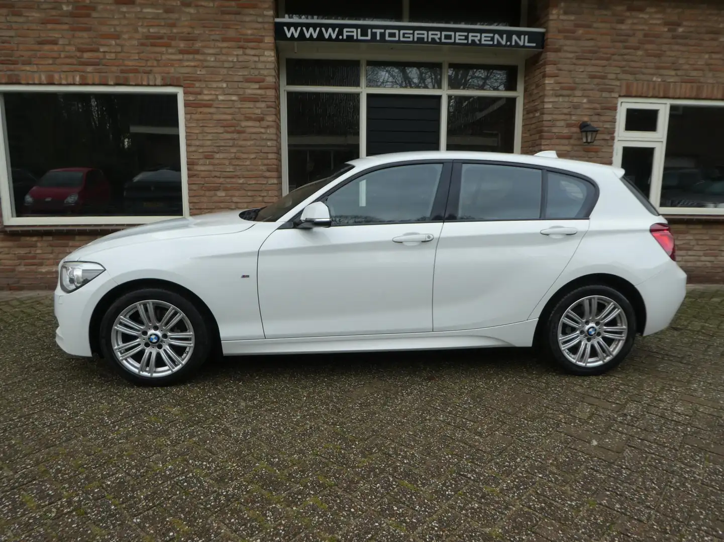 BMW 118 1-serie 118i M Sport Edition High Executive Automa Wit - 2