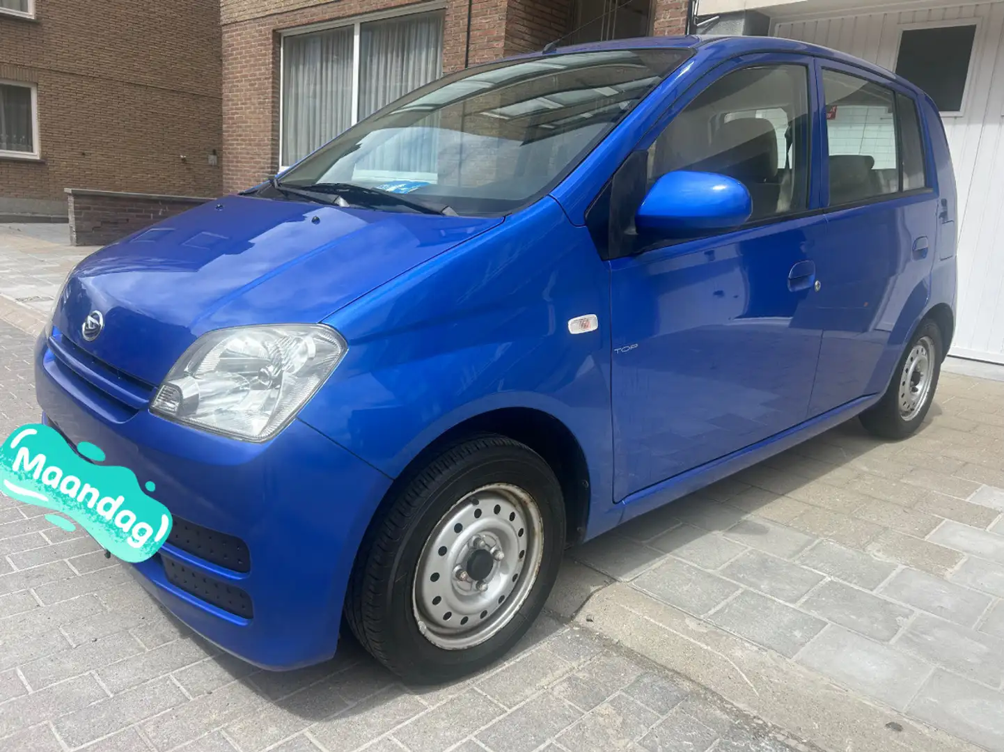Daihatsu Cuore 1.0 Top - 1