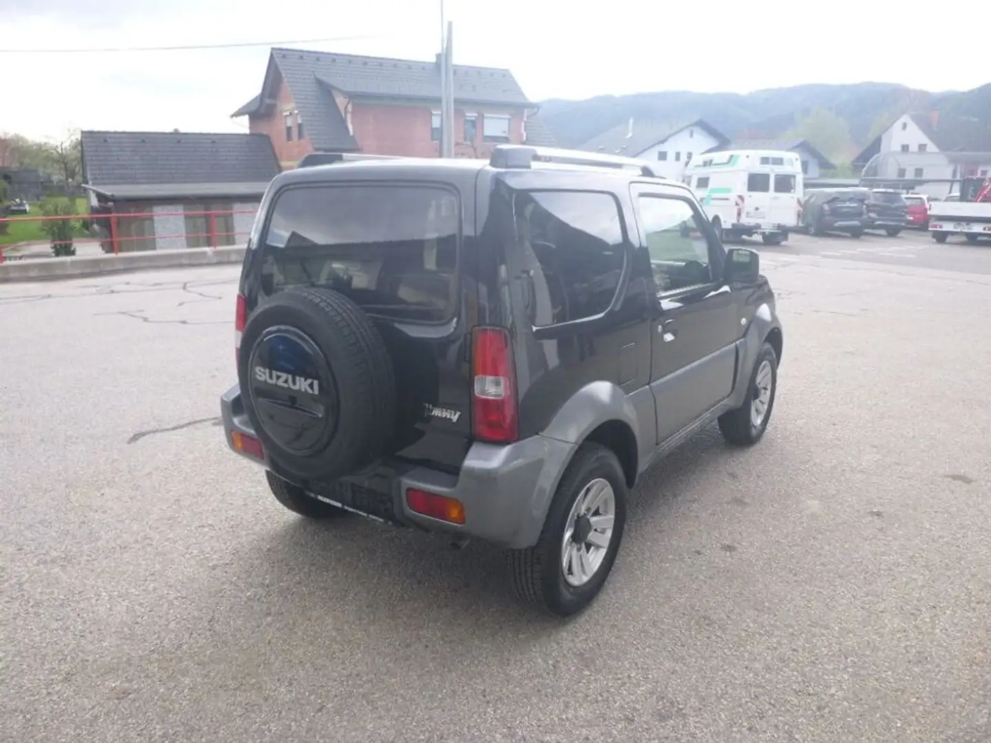 Suzuki Jimny 1,3 VX Lim.  1. Besitz Vermittlung Schwarz - 2