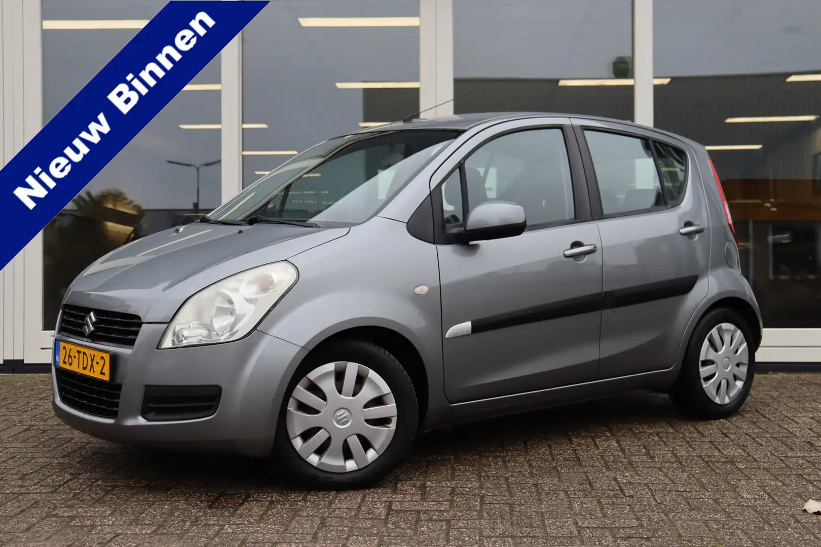 Suzuki Splash 1.0 VVT Comfort, Airco, Prijs Is Rijklaar Inclusie Gris - 1