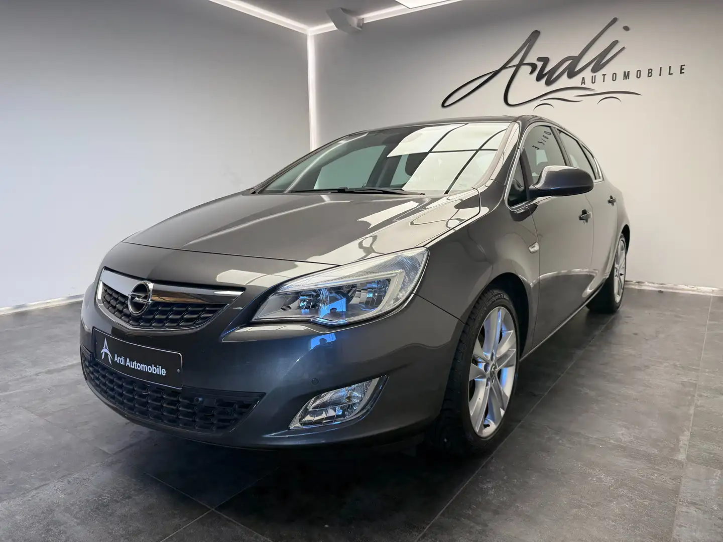 Opel Astra 1.4 Turbo *GPS*AIRCO*1ER PROP*GARANTIE 12 MOIS* Gris - 1