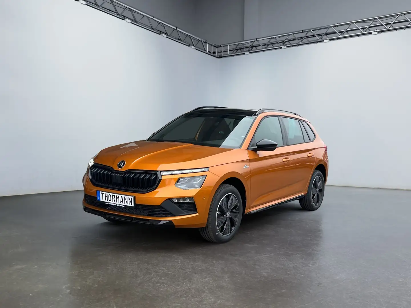 Skoda Kamiq Monte Carlo 1.0 TSI ACC Pano SpurH DynLi Oranje - 2