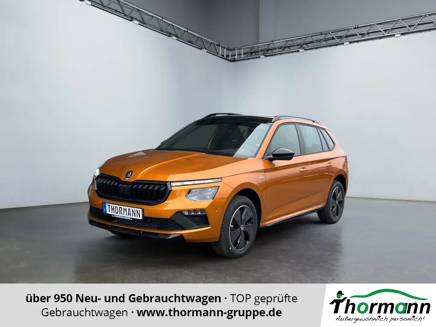 Skoda Kamiq Monte Carlo 1.0 TSI ACC Pano SpurH DynLi Oranje - 1