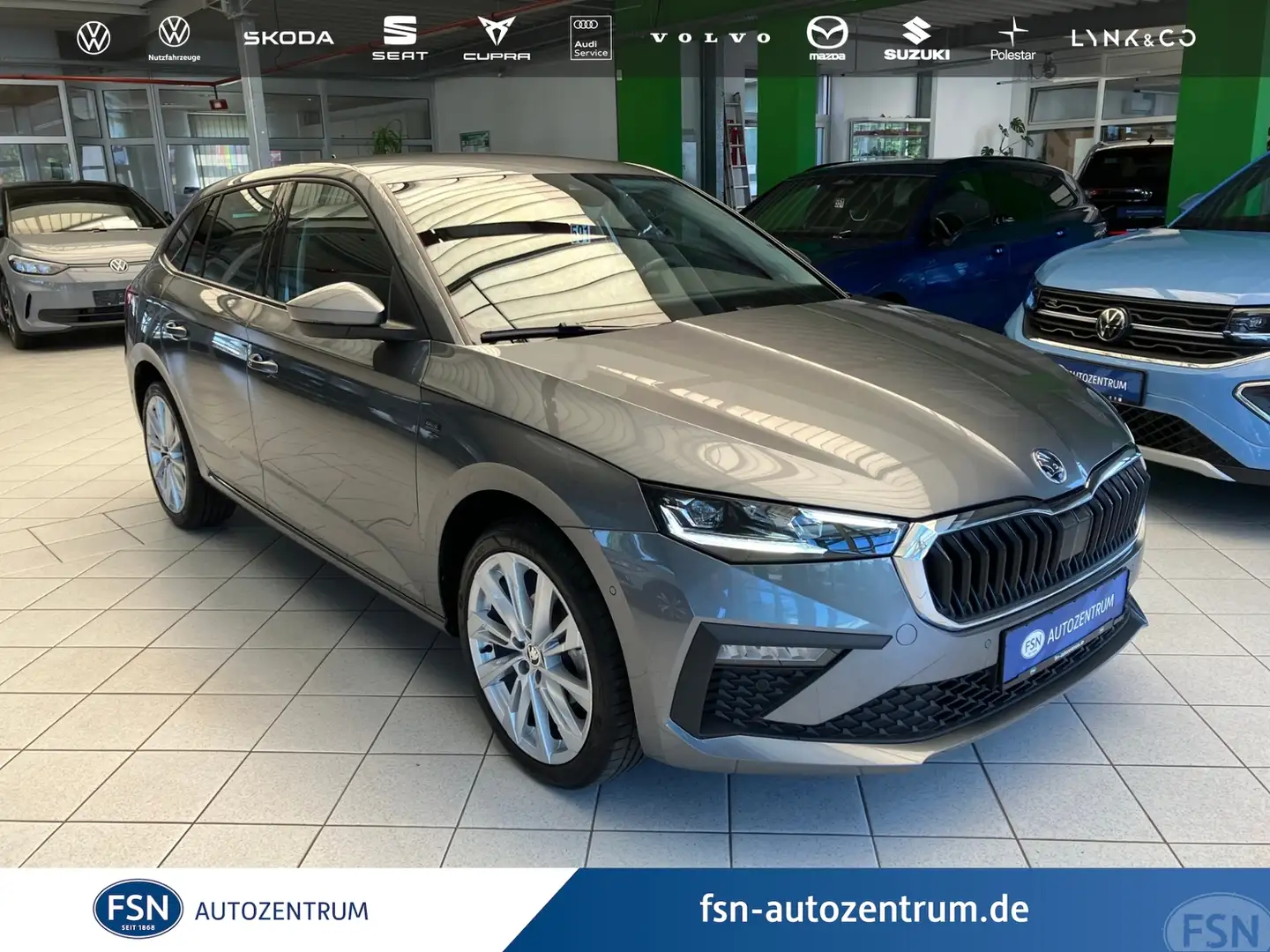 Skoda Scala 1.0 TSI Drive DSG AHK ACC LED Grijs - 1