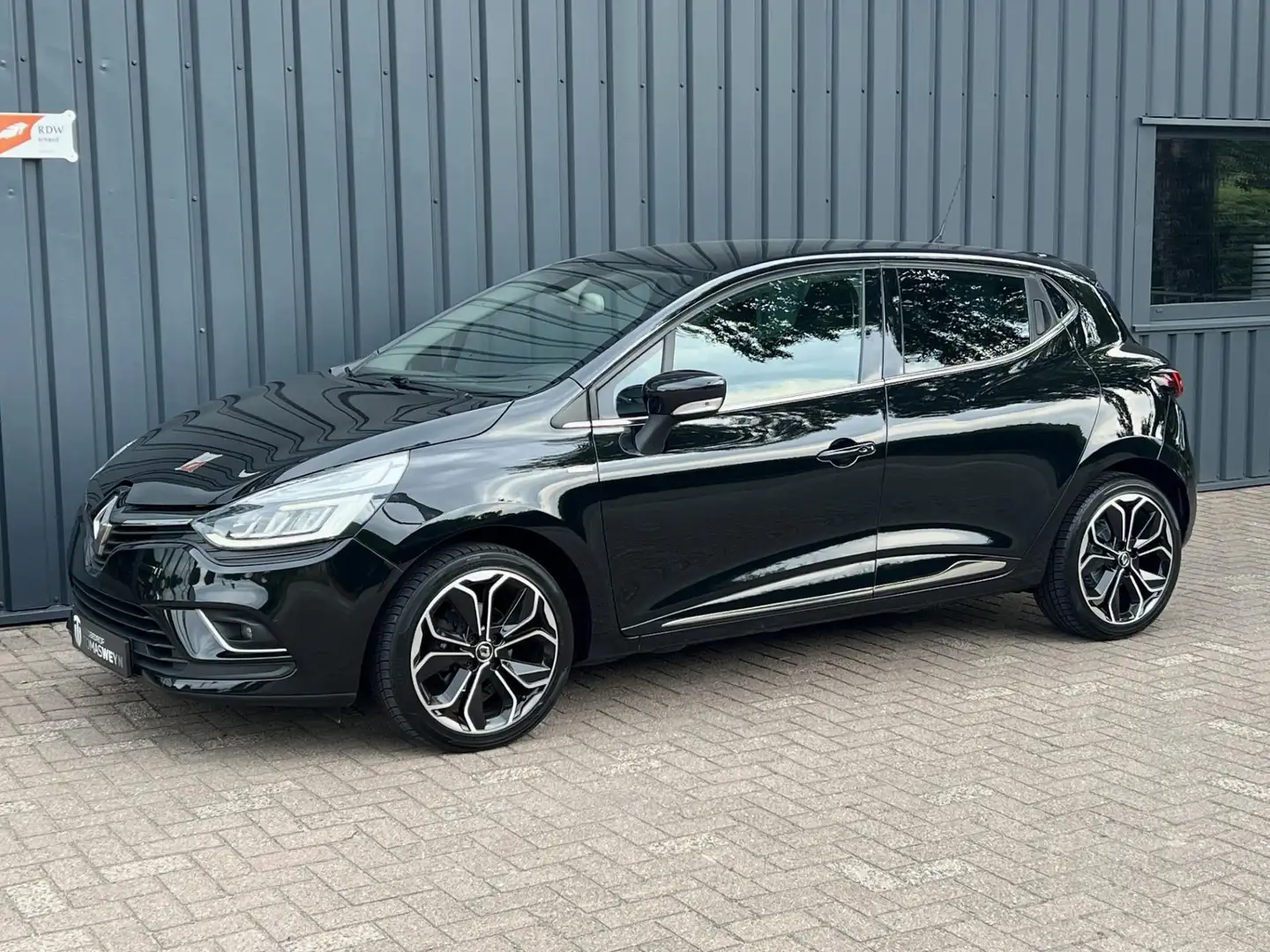 Renault Clio 0.9 TCe Bose NAVIGATIE!/CRUISE!/CLIMA!/COMPLEET!/ Zwart - 1
