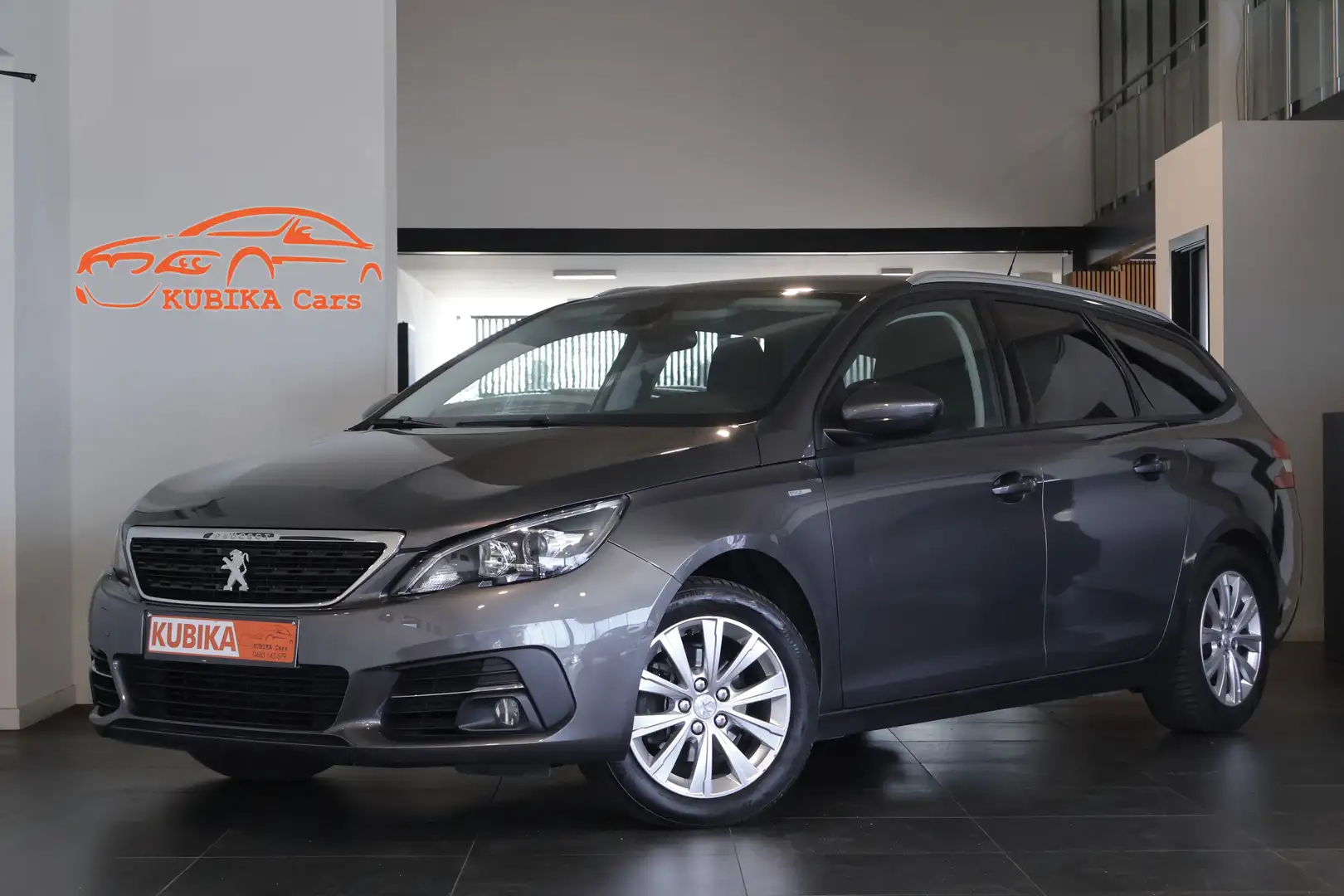 Peugeot 308 SW 1.2 PureTech Style Carplay Navi Garantie* Grijs - 1