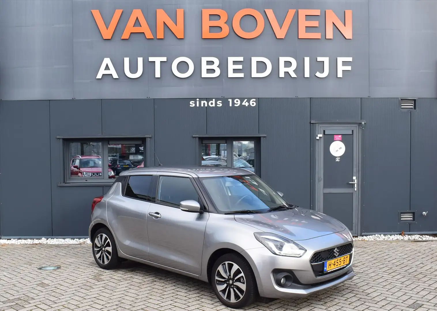 Suzuki Swift 1.2 90pk Smart Hybrid S&S Stijl Gris - 1