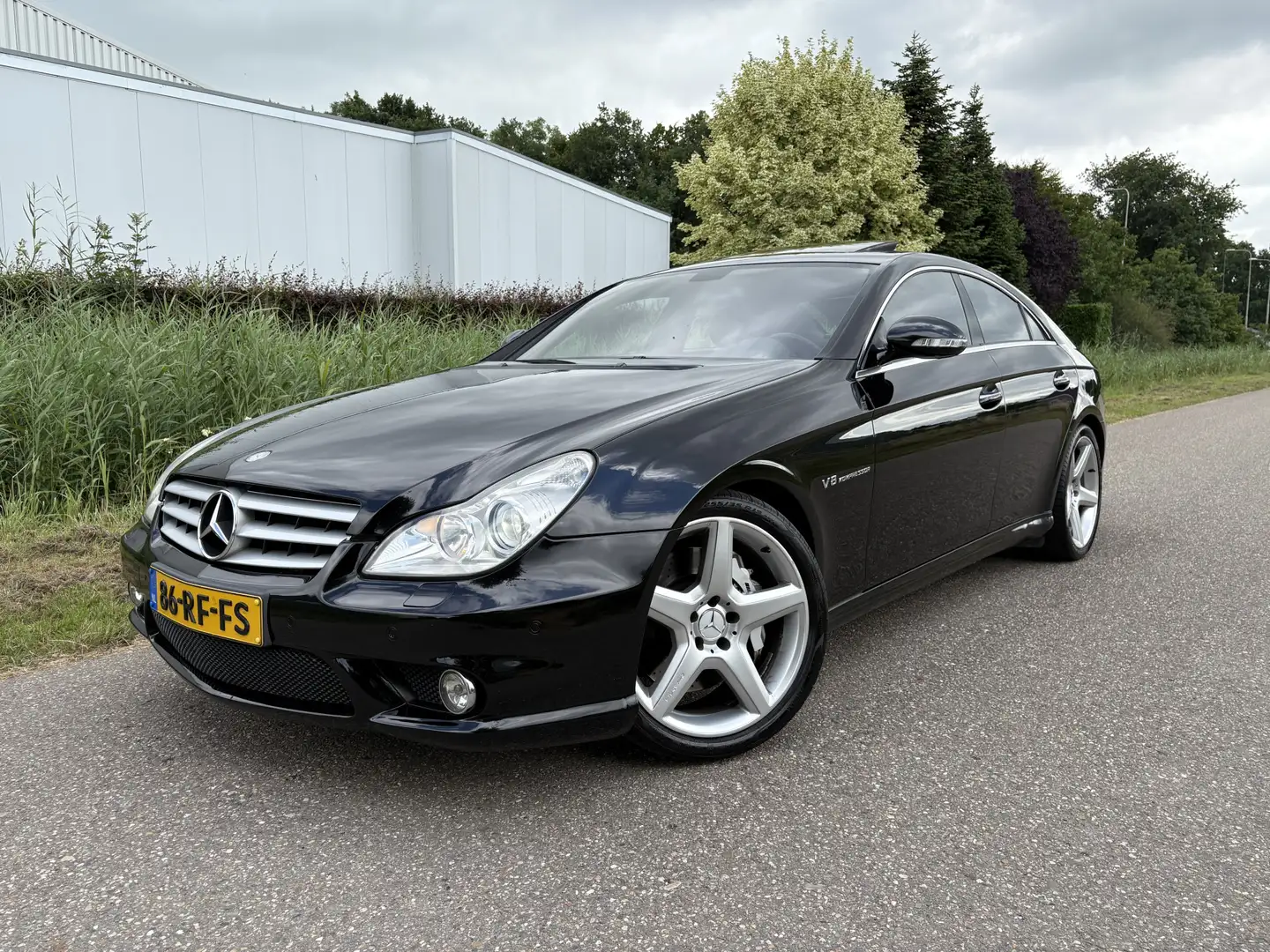 Mercedes-Benz CLS 55 AMG AUTOMAAT / ORG NED / SCHUIFDAK / ROLLO / NAVI Zwart - 1