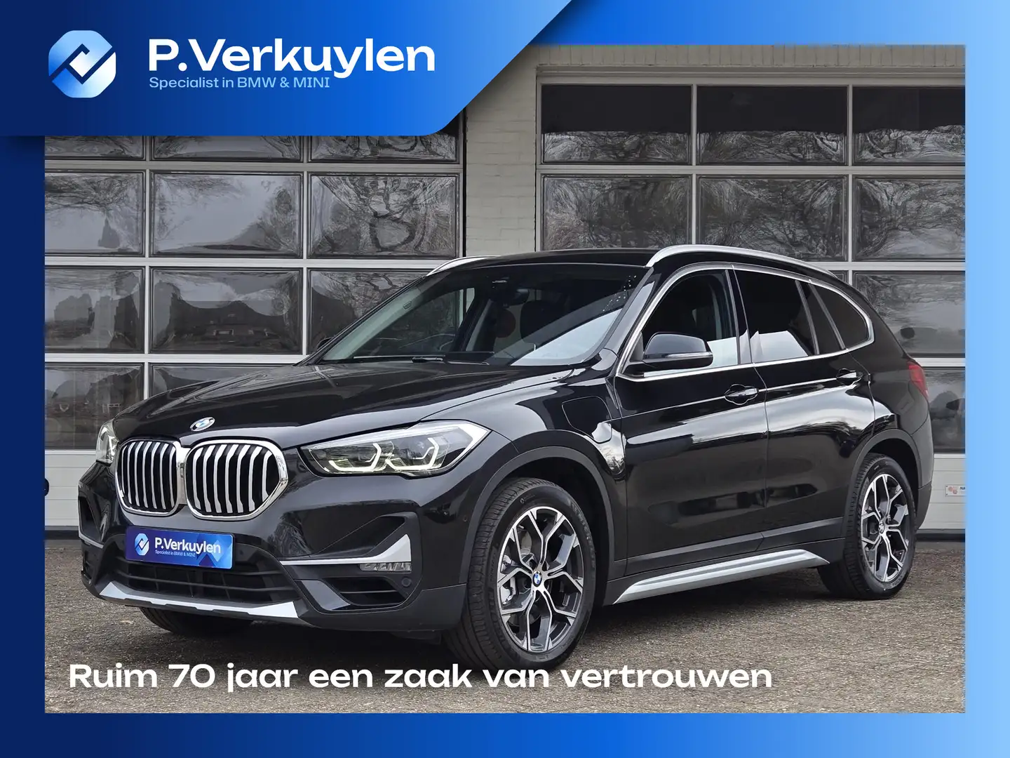 BMW X1 xDrive25e X Line | SPORTSTOELEN | NAVIGATIE PLUS | Zwart - 1