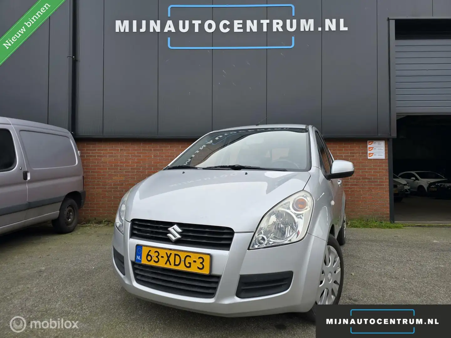 Suzuki Splash 1.0 VVT Comfort / NAP / AIRCO / APK / DEALER O Grijs - 1