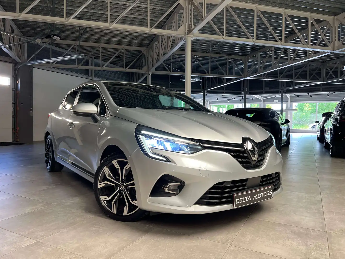 Renault Clio 1.5 Blue dCi * Airco * Hemeldak * NAVI * Xenon Argent - 1