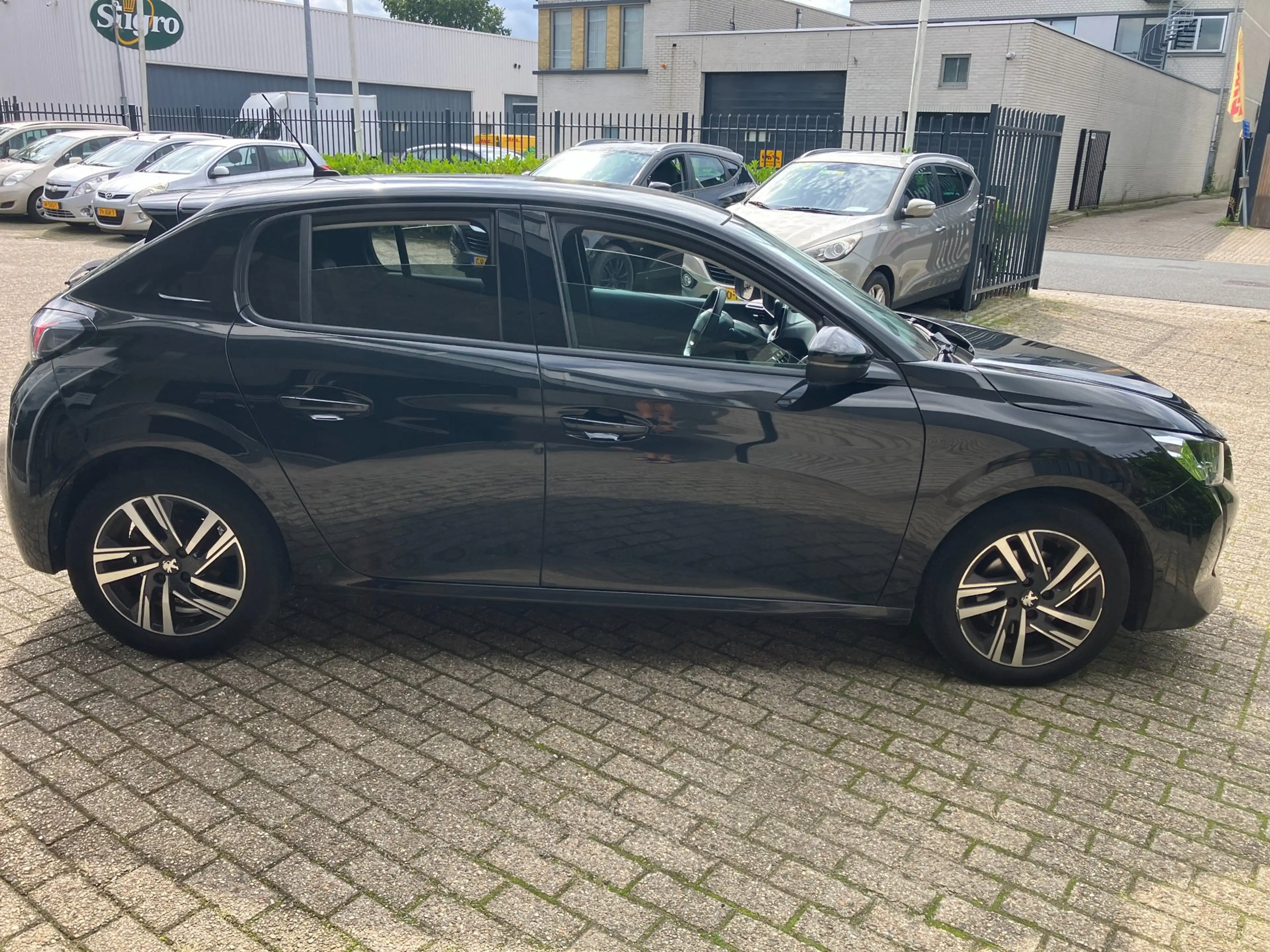 Peugeot 208 1.5 BlueHDi Blue Lease Allure / CLIMA / CAMERA / V — photo 14