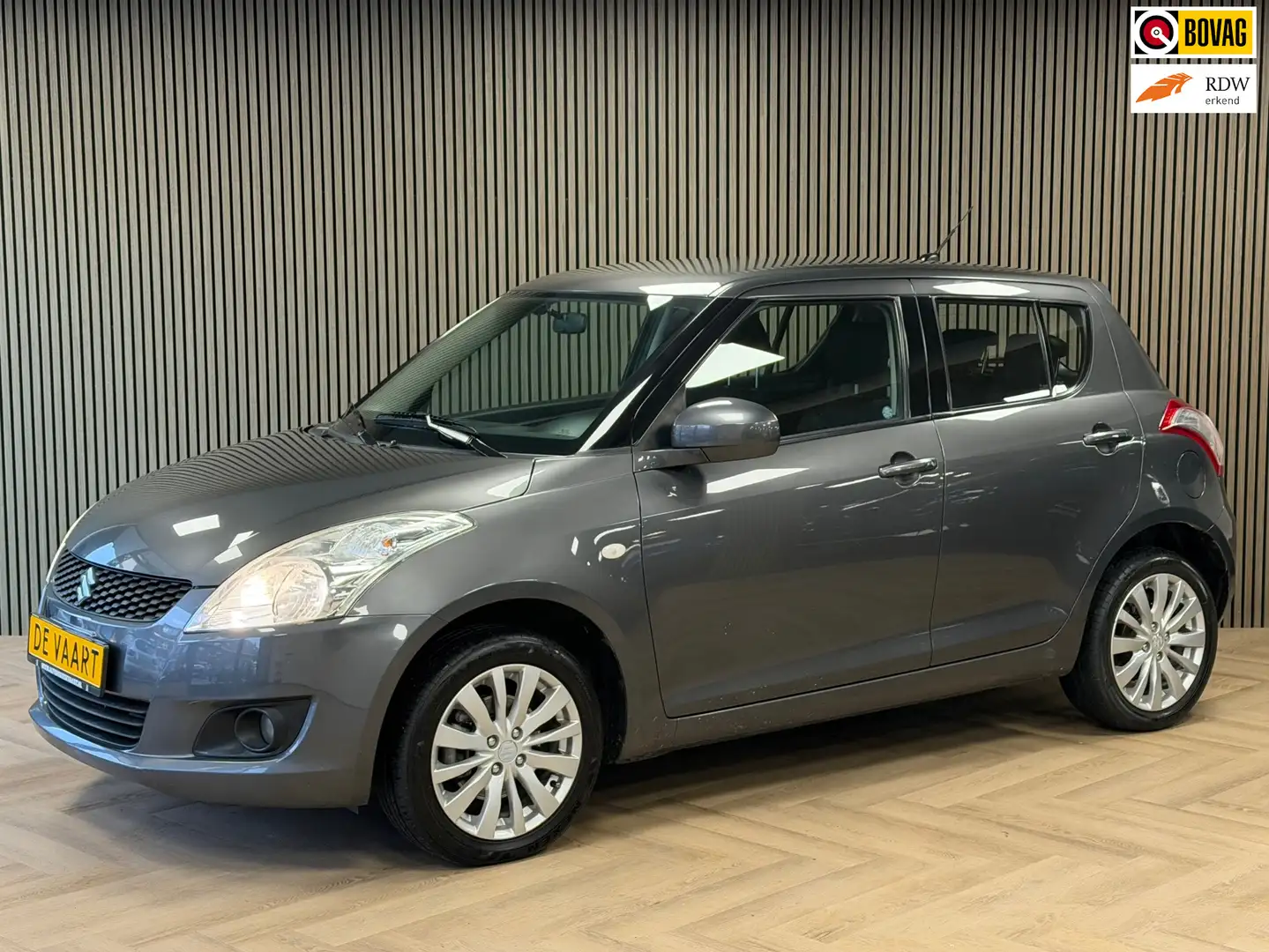 Suzuki Swift 1.2 Exclusive 4x4 AIRCO KEYLESS-GO STOELVERWARMING Grau - 1