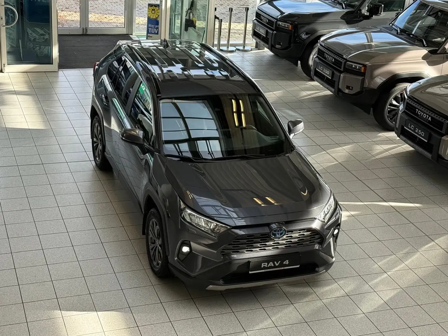 Toyota RAV 4 HYBRID-4x4-LED-LEDER-KAMERA-MOD. 2024 Gris - 2
