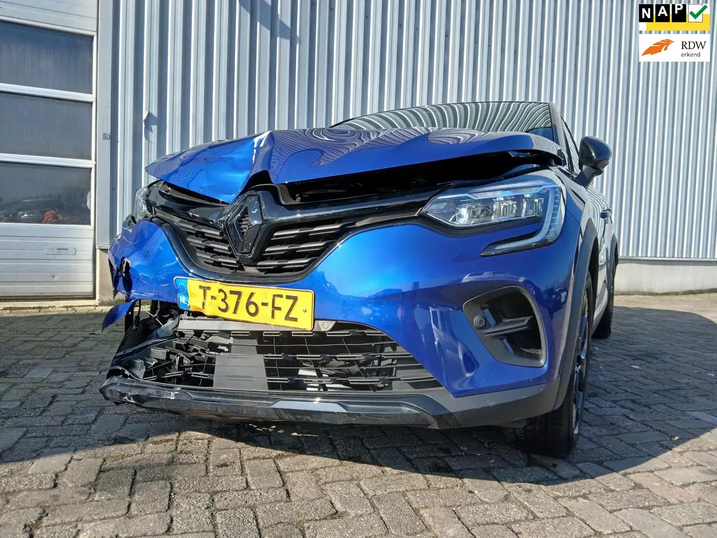 Renault Captur 1.6 E-Tech Hybrid 145 SL Rive Gauche - Frontschade Blauw - 1