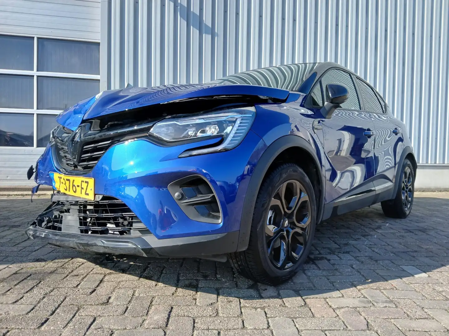 Renault Captur 1.6 E-Tech Hybrid 145 SL Rive Gauche - Frontschade Blauw - 2