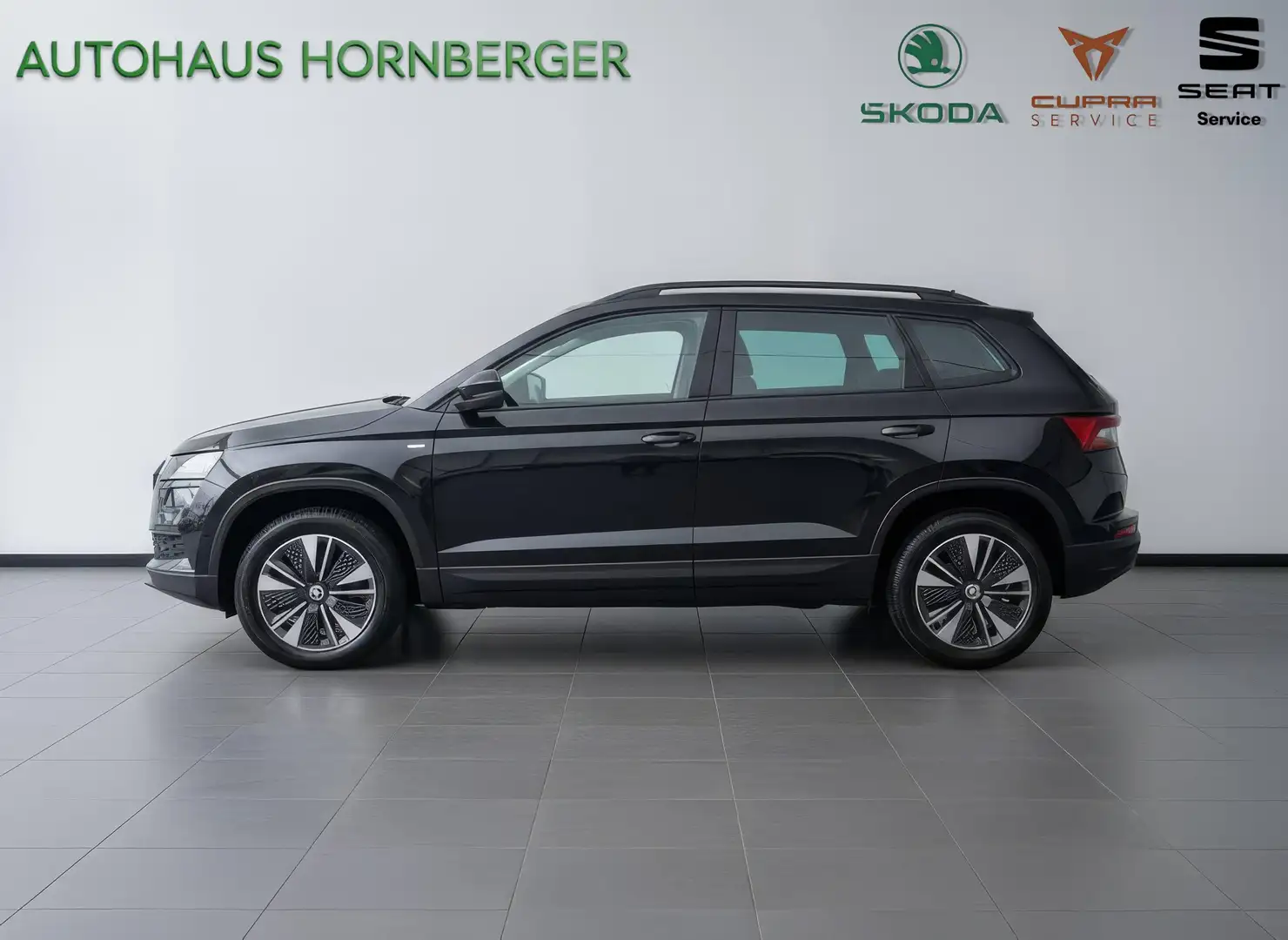 Skoda Karoq TourPlus 2.0TDI 115PS AHK Matrix NAVI Kamera PDC Schwarz - 2