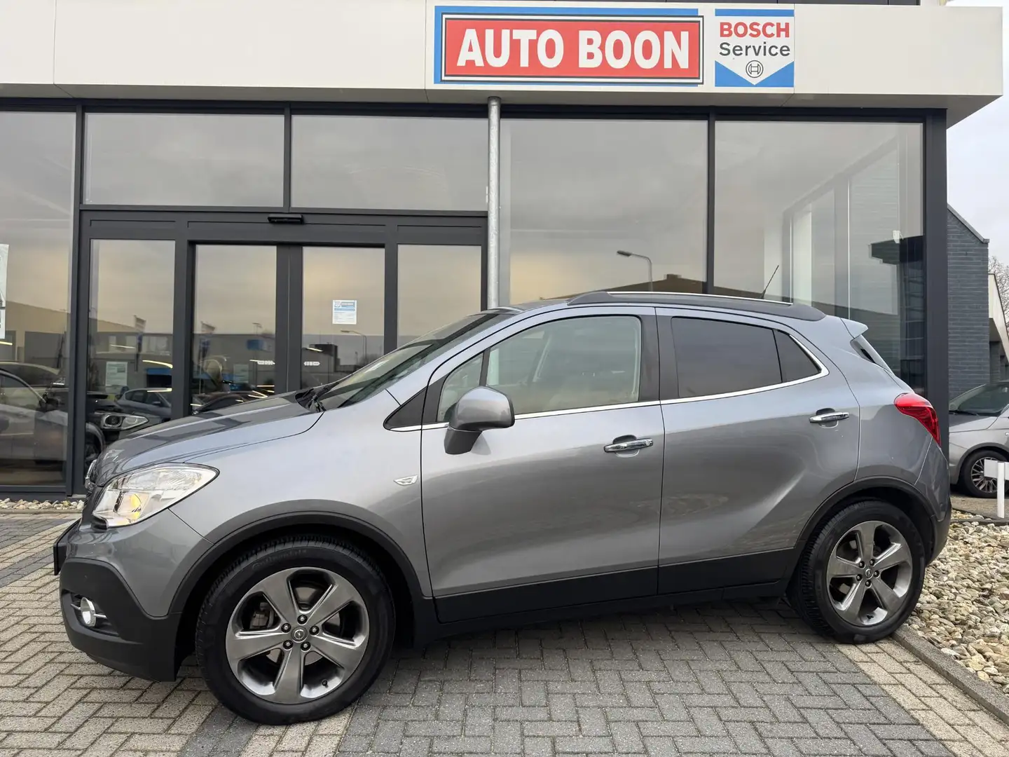 Opel Mokka 1.6 116PK COSMO : NAVI/P-CAM/2xPDC/CLIMA/MEDIA/ TR Grigio - 1