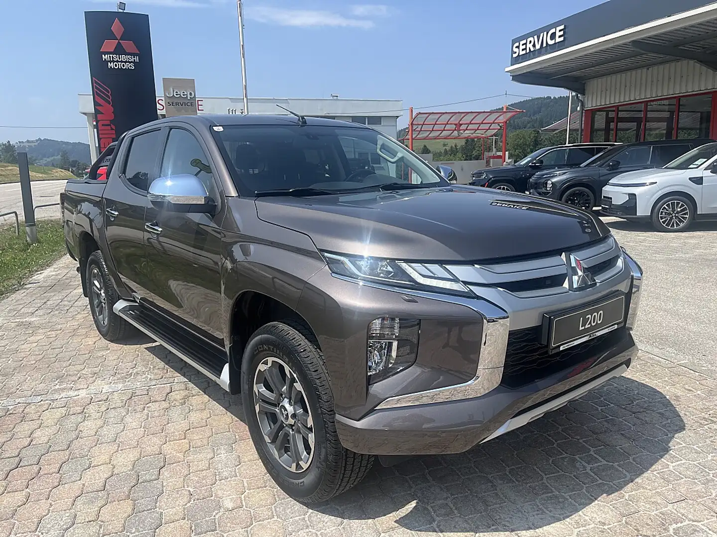 Mitsubishi L200 L 200 2,2 DI-D HP 4WD Doppelkabine Intense Aut. - 1