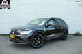 Volkswagen Tiguan 1.5 TSI Elegance / Navi / Cruise / Led / Trekhaak Schwarz - thumbnail 1