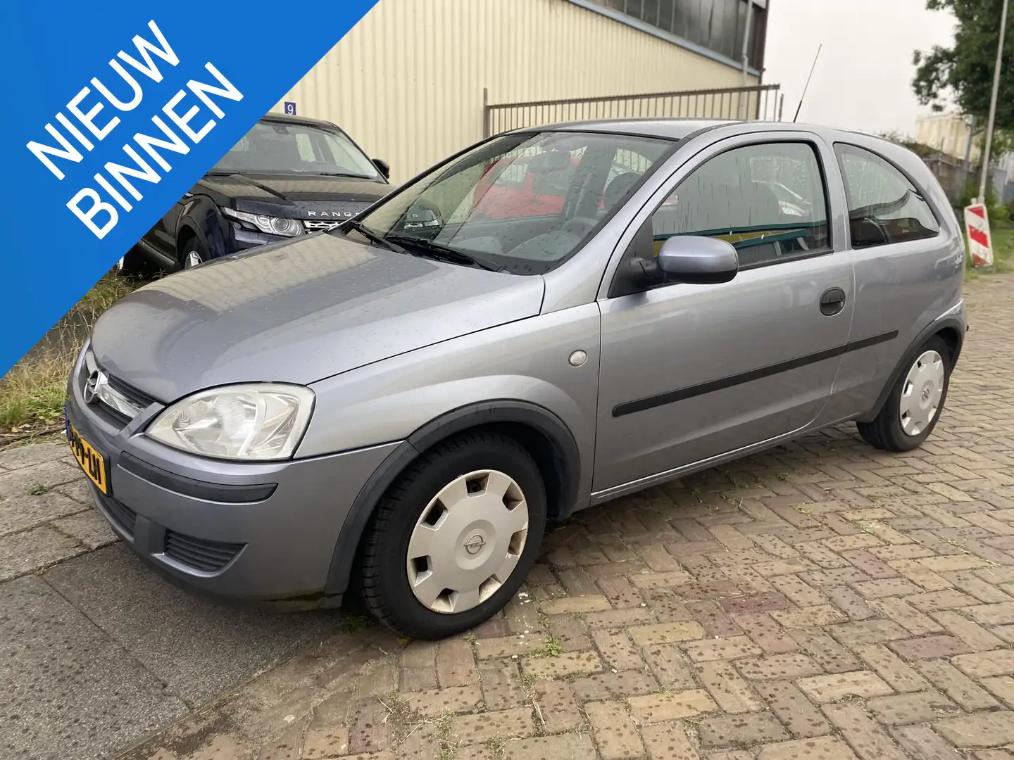 Opel Corsa 1.2-16V Rhythm Grijs - 1